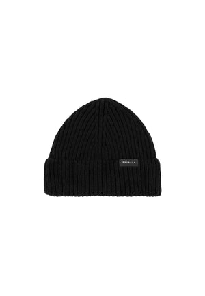 Product photo of a ribbed beanie in black.