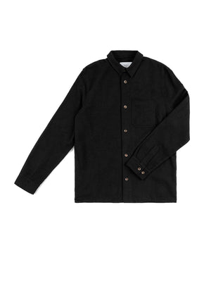 Product photo of a flannell shirt in black.