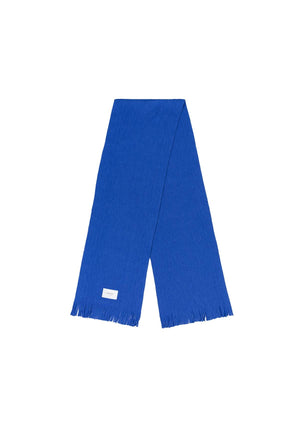 Product photo of a merino wool scarf in cobalt blue.