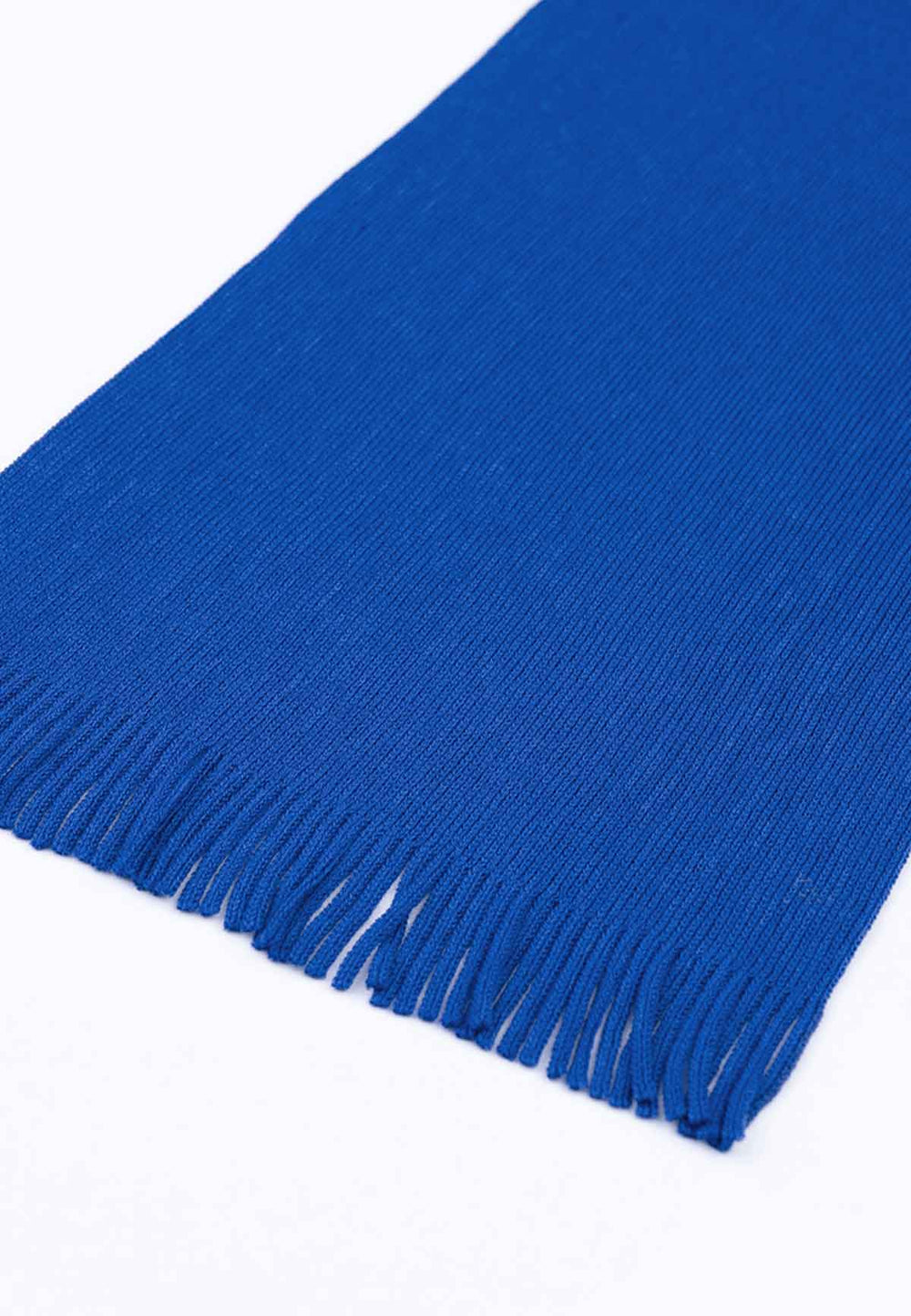 Close up photo of a merino wool scarf in cobalt blue.