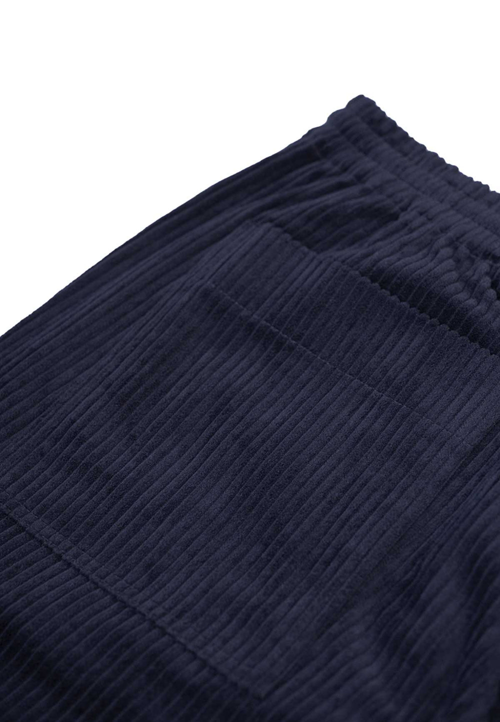 Close up of the back pocket of wide corduroy pants in navy.